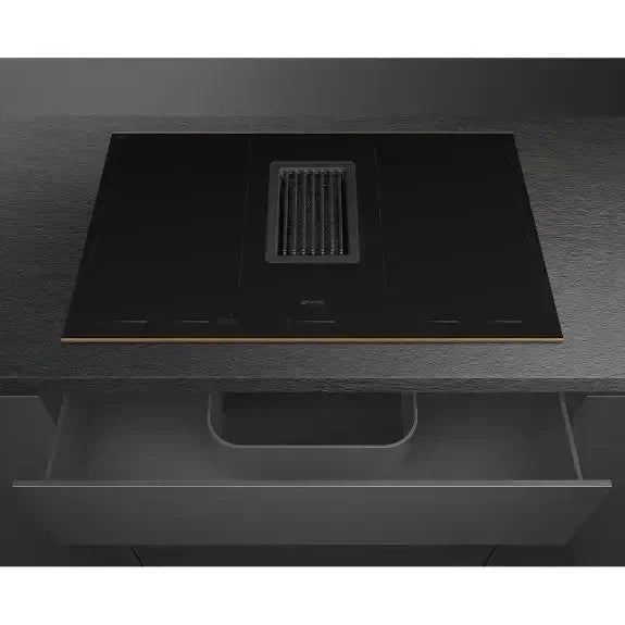 Sleek black induction cooktop with integrated vent, modern kitchen appliance
