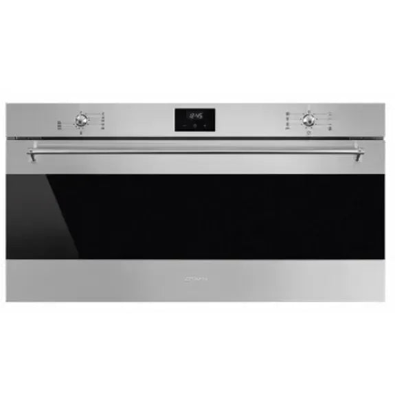 Stainless steel built-in oven with digital display and control knobs for modern kitchen appliances