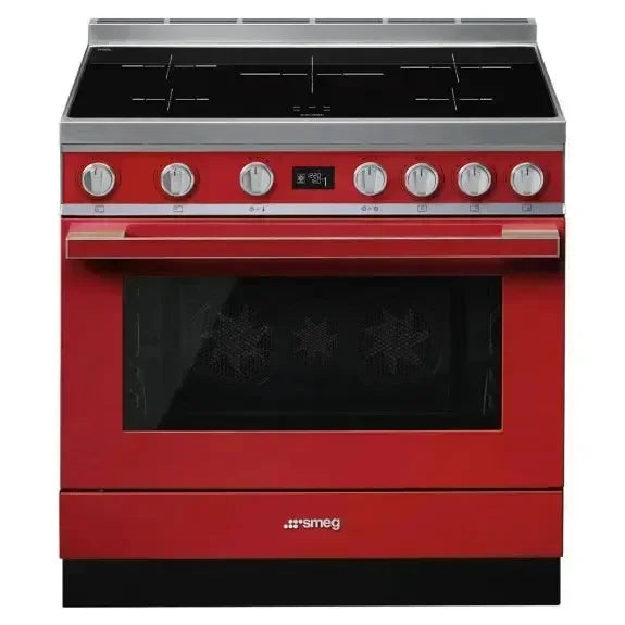 Vibrant red Smeg electric range with induction cooktop and oven, perfect for modern designer kitchens.